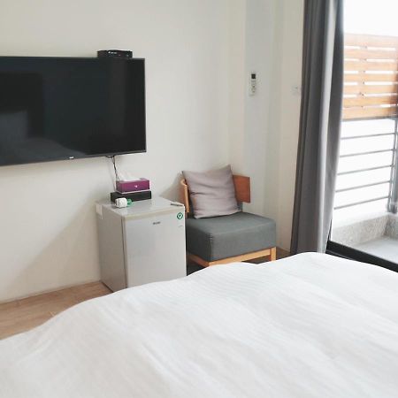 Happy Guesthouse Сяолюцю Экстерьер фото