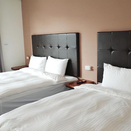 Happy Guesthouse Сяолюцю Экстерьер фото